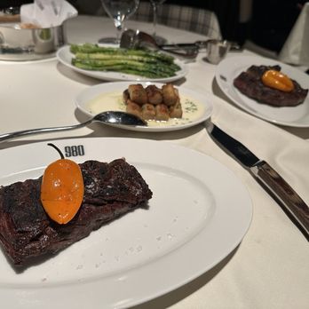980 Prime - Asparagus, gnocchi, steak....sadly disappointed!  Not even the pepper garnish could save this flavor!  Salt please! - Steakhouses Near Me - Cripple Creek, Colorado