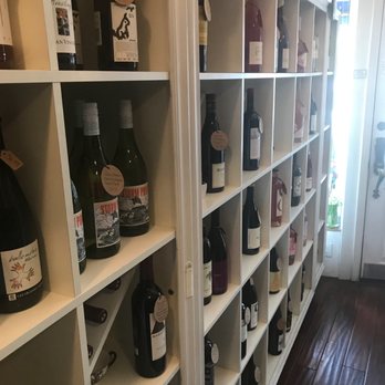 Down the Rabbit Hole Wine Boutique - wine bottles on shelves - Beer, Wine & Spirits Near Me - Sayville, New York
