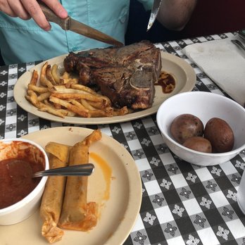 Doe's Eat Place - Porterhouse steak, fries, boiled potatoes, tamales with chili - Steakhouses Near Me - Bentonville, Arkansas Doe's Eat Place - Porterhouse steak, fries, boiled potatoes, tamales with chili - Steakhouses Near Me - Bentonville, Arkansas