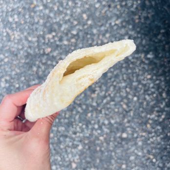 La Loma Panaderia & Restaurant - a hand holding a piece of bread - Bakeries Near Me - Chesapeake, Virginia La Loma Panaderia & Restaurant - a hand holding a piece of bread - Bakeries Near Me - Chesapeake, Virginia