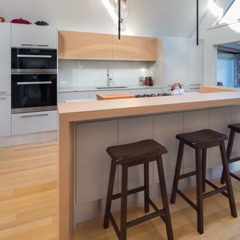 Fontile Kitchen & Bath - This beautiful natural oak stain paired with a light high pressure laminate in cement brings this West Vancouver kitchen project together. - Kitchen & Bath Near Me - Vancouver, British Columbia Fontile Kitchen & Bath - This beautiful natural oak stain paired with a light high pressure laminate in cement brings this West Vancouver kitchen project together. - Kitchen & Bath Near Me - Vancouver, British Columbia