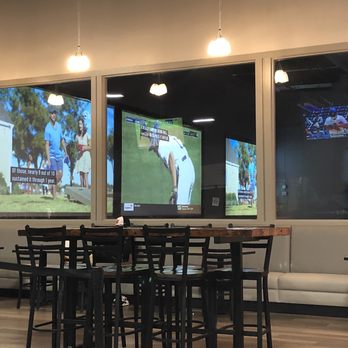 Surge Entertainment By Drew Brees - Dining area - Arcades Near Me - Lafayette, Louisiana Surge Entertainment By Drew Brees - Dining area - Arcades Near Me - Lafayette, Louisiana