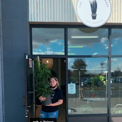 The Little Plant Shop - Gabby is all smiles holding our massive Monstera Adansonii totem that's almost as tall as her  #baps #bigassplants #weloveplants #shoploca