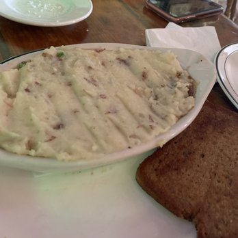 Byrne's Irish Pub - Shepherd's Pie with a slice of Guinness bread. - Irish Pub Near Me - Bath, Maine