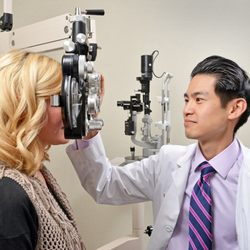 Price Vision Group - Dr. Matthew Feng examines a patient.