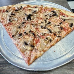 Verrazzanos New York Pizza - 2 mushroom, sausage slices nice and tasty NY pizza!