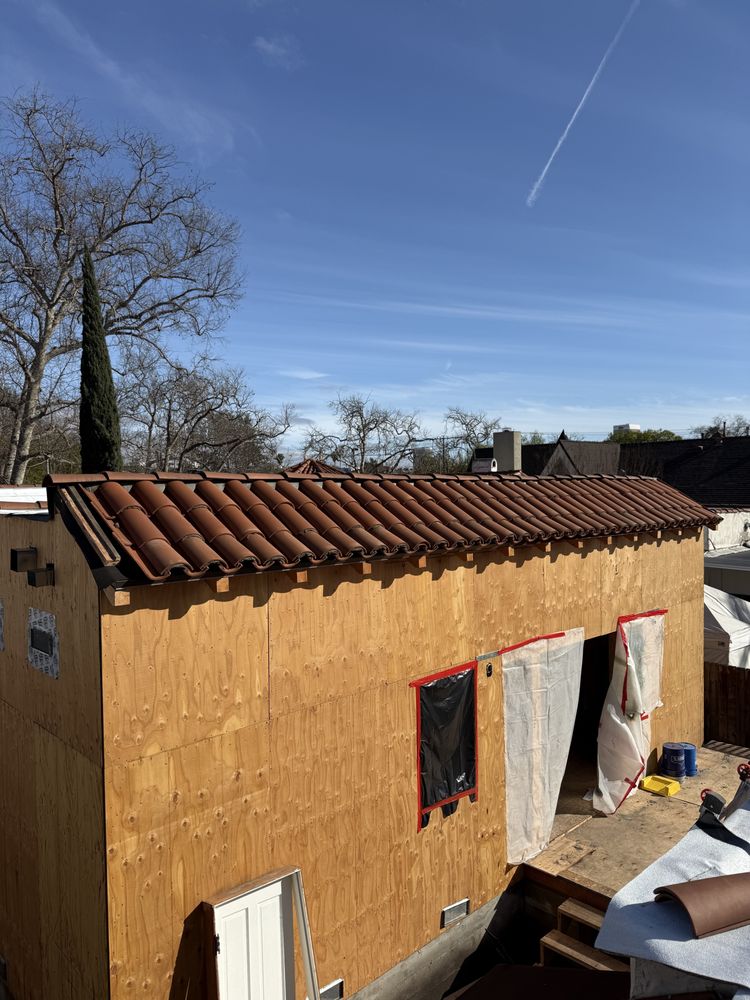 Slide of Real Bros Roofing