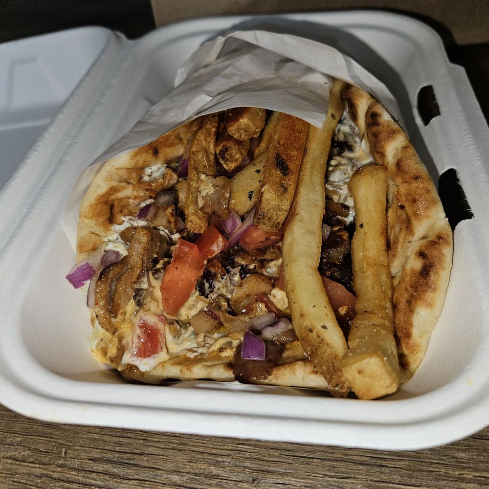 Karv Greek Kouzina - Traditional Pork Gyro - Greek Near Me - Windham, New Hampshire Karv Greek Kouzina - Traditional Pork Gyro - Greek Near Me - Windham, New Hampshire