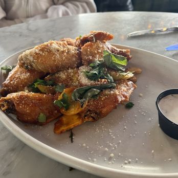 Culinary Dropout - HOT WINGS  buffalo sauce, honey mustard seed, shaved carrots & celery - New American Near Me - Denver, Colorado