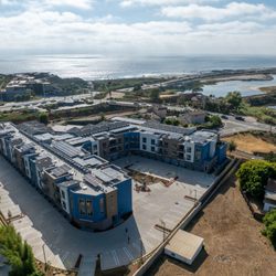 Triton Encinitas - Aerial view of Triton with the Ocean & Lagoon in the background