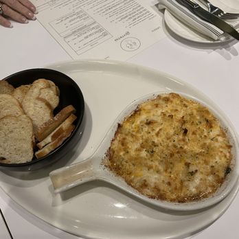 Gemma Fish + Oyster - Baked crab and artichoke dip with toast points - Seafood Near Me - Jacksonville, Florida Gemma Fish + Oyster - Baked crab and artichoke dip with toast points - Seafood Near Me - Jacksonville, Florida