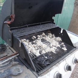 This is the grill by the pool. The squished hot dog on the side had been there for a long, long time. Gross.