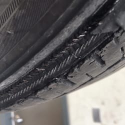 Goodyear Tire Center - Complete road hazard, damaged tire.
