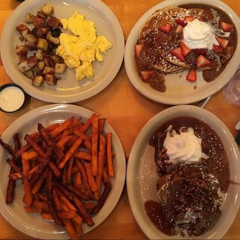 Crow's Nest - scrambled eggs, breakfast potatoes, sweet potato fries, banana bread french toast, strawberry pancakes - Breakfast & Brunch Near Me - Kalamazoo, Michigan