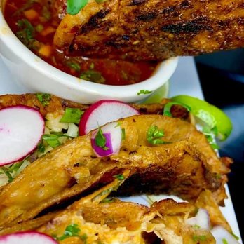 Crav’N Da flava - a plate of food - Food Trucks Near Me Crav’N Da flava - a plate of food - Food Trucks Near Me
