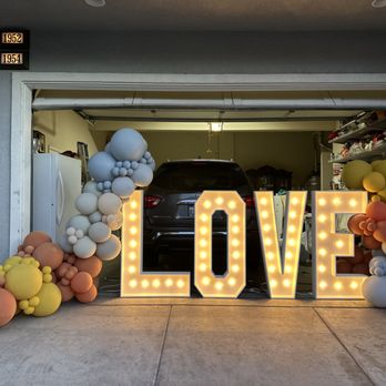 Starlite Marquee - Make your event unforgettable with our stunning LOVE marquee letters! Perfect for weddings, engagements, and more. Brighten your big moments - Balloon Services Near Me Starlite Marquee - Make your event unforgettable with our stunning LOVE marquee letters! Perfect for weddings, engagements, and more. Brighten your big moments - Balloon Services Near Me