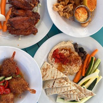 The Rooftop Lounge - Wings Calamari Coconut Shrimp Hummushummus - Lounges Near Me - Laguna Beach, California The Rooftop Lounge - Wings Calamari Coconut Shrimp Hummushummus - Lounges Near Me - Laguna Beach, California