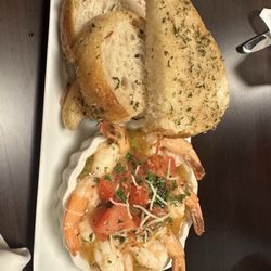 Shrimp appetizer this garlic shrimp dish included bread and the butter garlic flavor was perfect on the shrimp one of my favorites