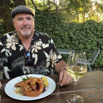 Tisza Bistro - Schnitzel in the beer garden with giant pretzel - Modern European Near Me - Healdsburg, California Tisza Bistro - Schnitzel in the beer garden with giant pretzel - Modern European Near Me - Healdsburg, California