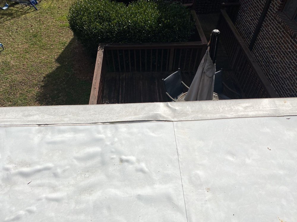 Slide of Faile Roofing