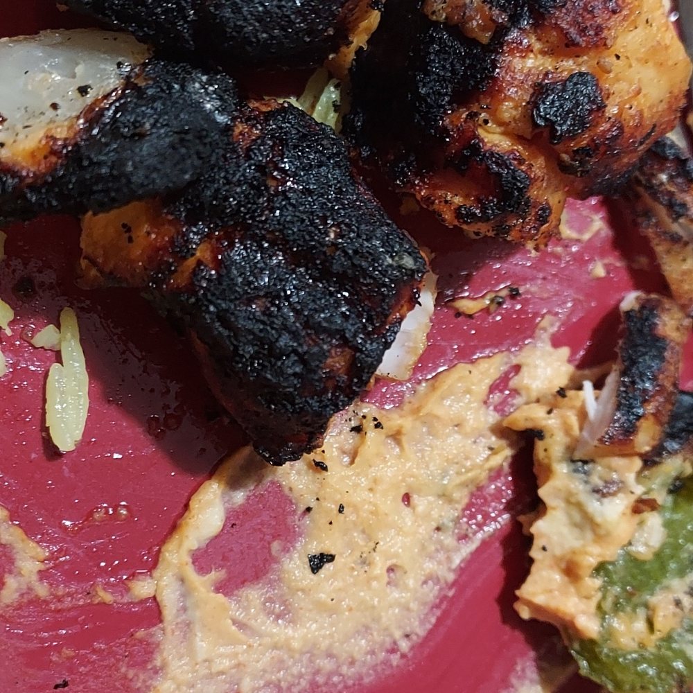 These are burned pieces of chicken. Both boxes were burned the same. I understand cooks accidentally burn the food but please, don't serve. These are burned pieces of chicken. Both boxes were burned the same. I understand cooks accidentally burn the food but please, don't serve.