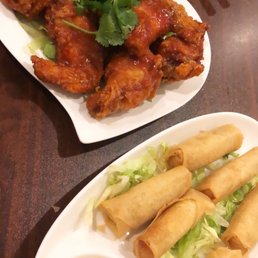 Spicy chicken wings and spring rolls Spicy chicken wings and spring rolls