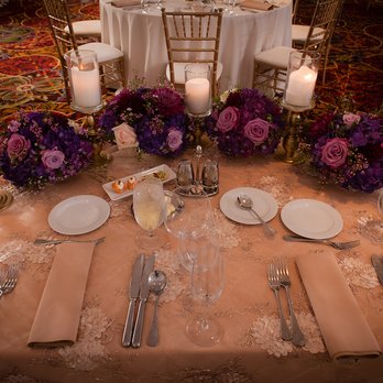 Prestige Wedding Decoration - Floral and pillar candles provided by PWD. - Wedding Planning Near Me - Schaumburg, Illinois