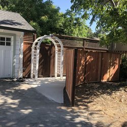 Frank's Landscaping and Concrete - Trash can area, arbor and fence