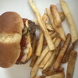 Wayback Burgers - Not a fan- so much mustard , bland tasting, and expensive . The bun is dried out.