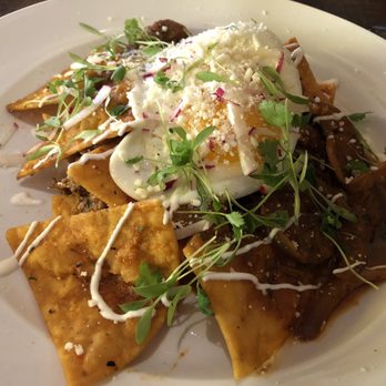 Cha Cha's Latin Kitchen - braised short rib chilaquiles - Bars Near Me - Brea, California Cha Cha's Latin Kitchen - braised short rib chilaquiles - Bars Near Me - Brea, California