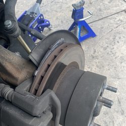 Happy Engine Auto Repair - Front brake pads came off the caliper.