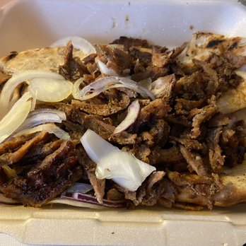 Morena aan de Amstel - Plenty of meat on top of pita bread. Full of delicious flavor. - Greek Near Me - Amsterdam, New Hampshire