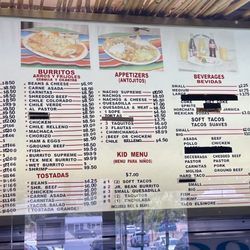 Tacos Elsinore sign over counter