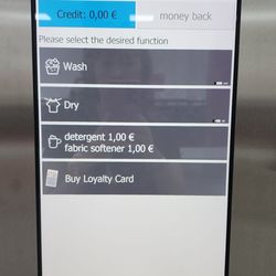 City SB - Waschcenter - Awesome laundromat in Munich. You pay at the machine by choosing the number of the corresponding washer or dryer.