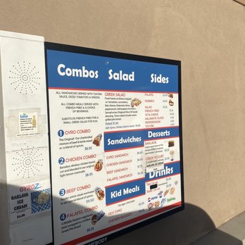 Gyroz - a menu on a sign in front of a building - Mediterranean Near Me - Denver, Colorado