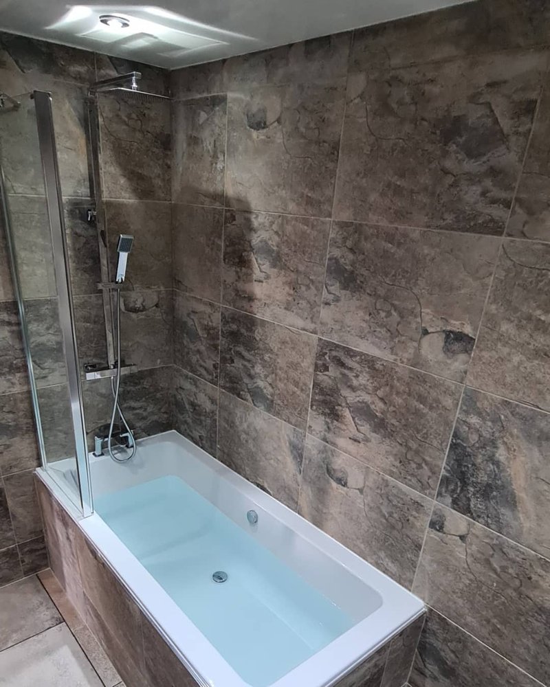 Slide of Magic Plumbing & Drain Cleaning