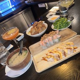 Happy hour eats Edamame Miso Soup Karaage Chicken The Classic Roll*