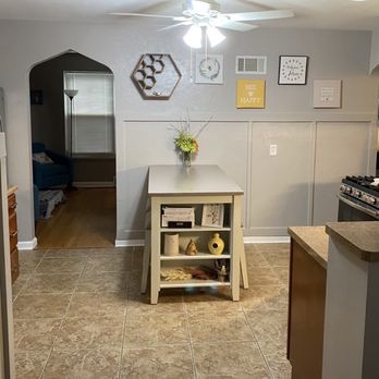 Boonma Contracting - He put together the table, did the wainscoting on the wall, painted the table and wall, and hung the pictures. - General Contractors Near Me
