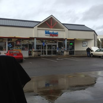 Chevron - a woman walking in front of a store - Gas Stations Near Me - North Plains, Oregon Chevron - a woman walking in front of a store - Gas Stations Near Me - North Plains, Oregon