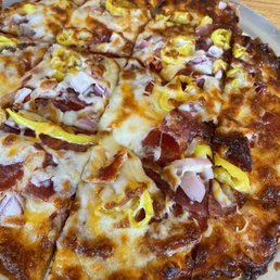 The Ranger Salami. pepperoni. red ontons, and banana peppers. Was very good!! The Ranger Salami. pepperoni. red ontons, and banana peppers. Was very good!!