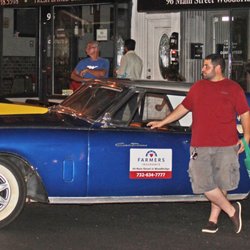 Jab Automotive Service Center - Joey Barros of JAB Automotive posing with one of his classic car clients at the Woodbridge Downtown Cruise.