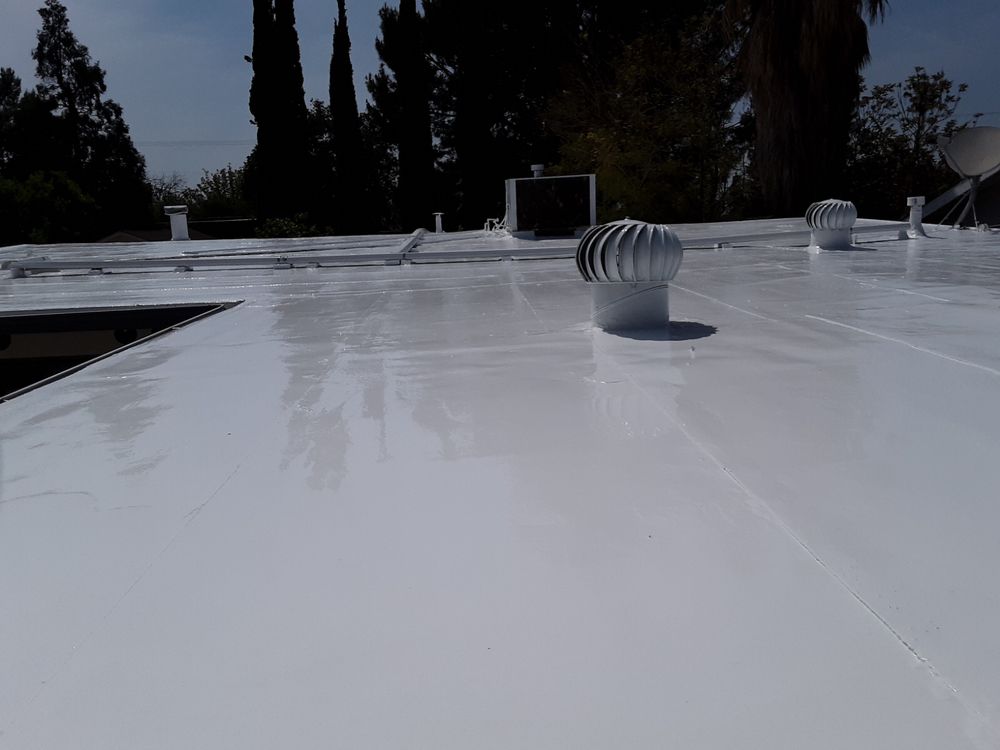 Slide of Reno's Roofing