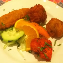 The Everest Tandoori - Mixed starter- chicken pakora , chicken tikka, aloo pakora and onion bhaji