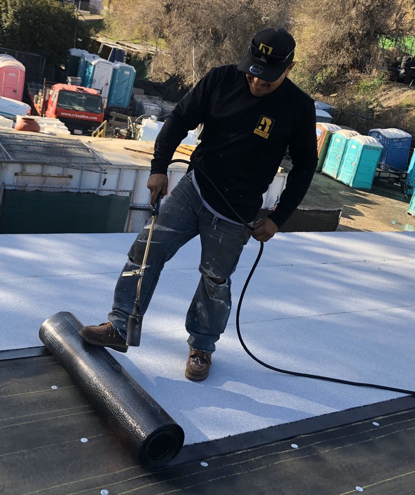 Slide of Reno's Roofing