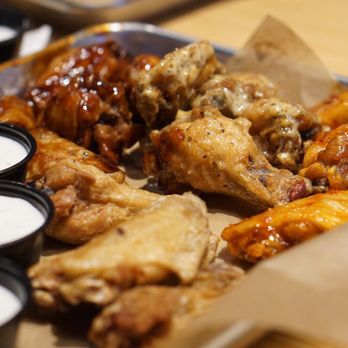Buffalo Wild Wings - Large size portion chicken wings with ranch dipping sauce - Sports Bars Near Me - Kaneohe, Hawaii Buffalo Wild Wings - Large size portion chicken wings with ranch dipping sauce - Sports Bars Near Me - Kaneohe, Hawaii