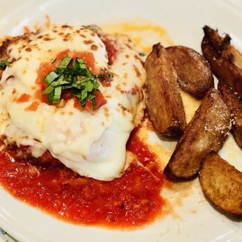 Romano's Macaroni Grill - Chicken Parmigiana Benedict with Potato wedges (Brunch Special) - Italian Near Me