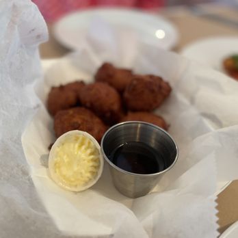 Red River BBQ - Corn fritters with whipped honey butter and maple syrup dipping sauce. Seriously *massive* flavors. Exquisite. - Barbeque Near Me - Harwich, Massachusetts