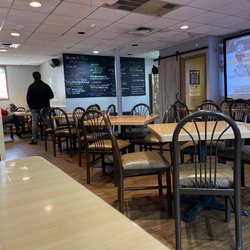 Elly's - Back room, big screen and specials board!