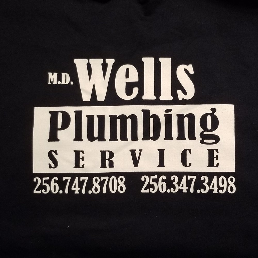Slide of M.D. Wells Plumbing Service