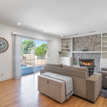 Custom Painting & Decorating - a living room with a fireplace - Painters Near Me - Anaheim, California